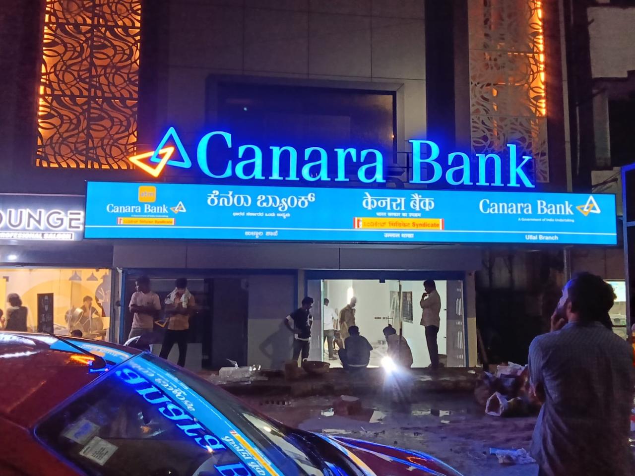 Modern commercial building with professional signage installation showcasing structural construction expertise